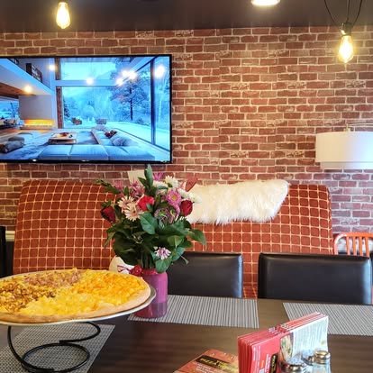 Hot and Ready Your Way: Fast Pick-UP or Fresh Delivery at The Pizza House
