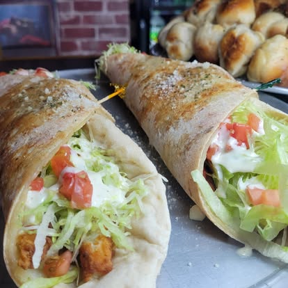 Hot and Ready Your Way: Fast Pick-UP or Fresh Delivery at The Pizza House
