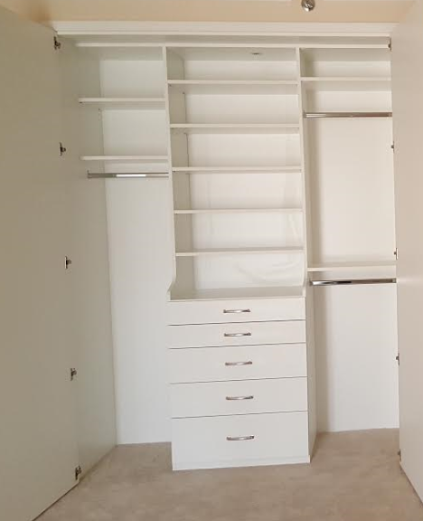 Custom Built-In White 4 Drawer Tower with Shelving from Top Shelf